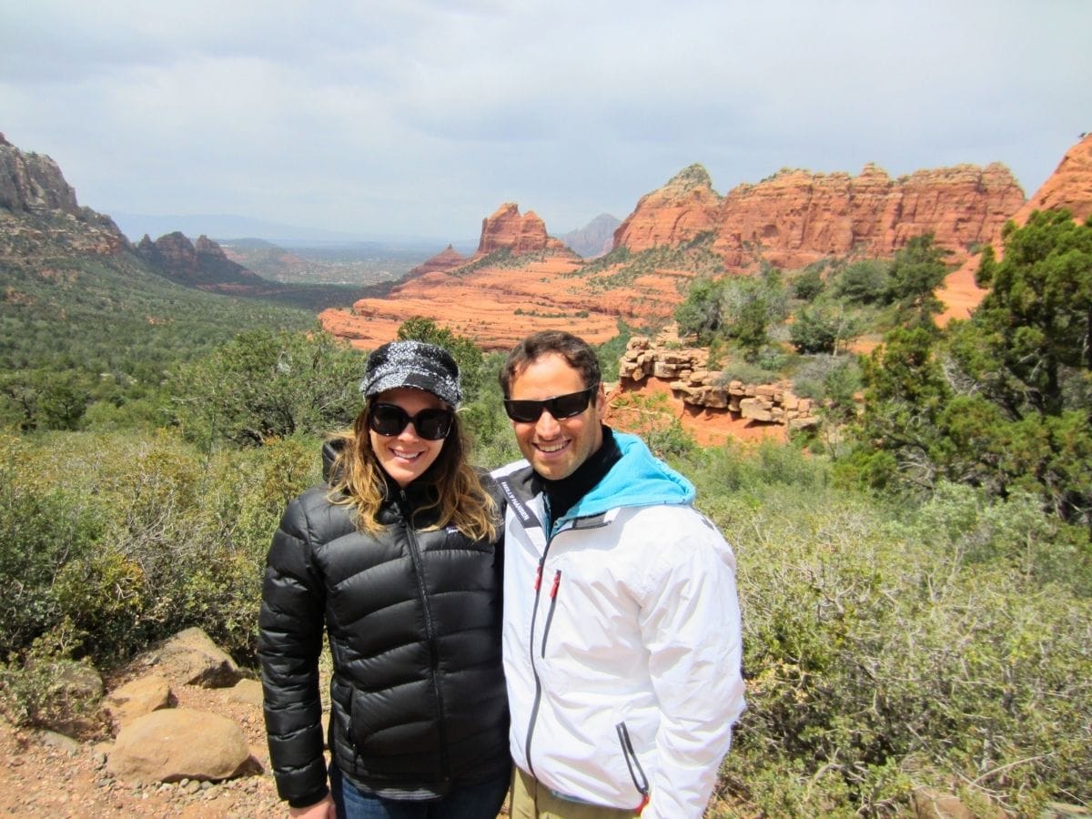 Ashlee & Pablo posing for a picture outside of Sedona, Arizona.