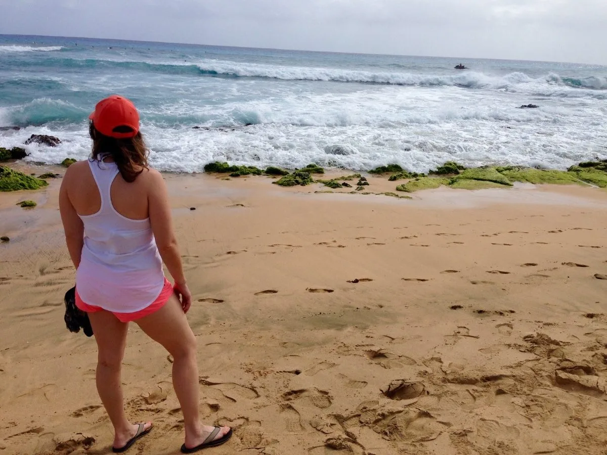 Ashlee standing on a beach on the east side of Oahu