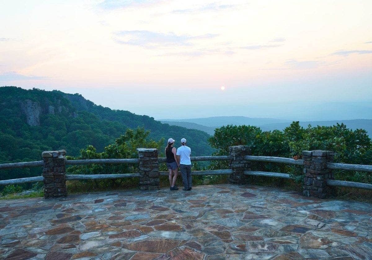 Ashlee & Pablo watching the sunset at Mount Magazine State Park